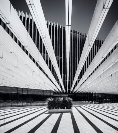 EDP Building stands out against its environment due to its unique design and materials used for construction. Its reflective surfaces create interesting patterns as light reflects off them from different angles.
